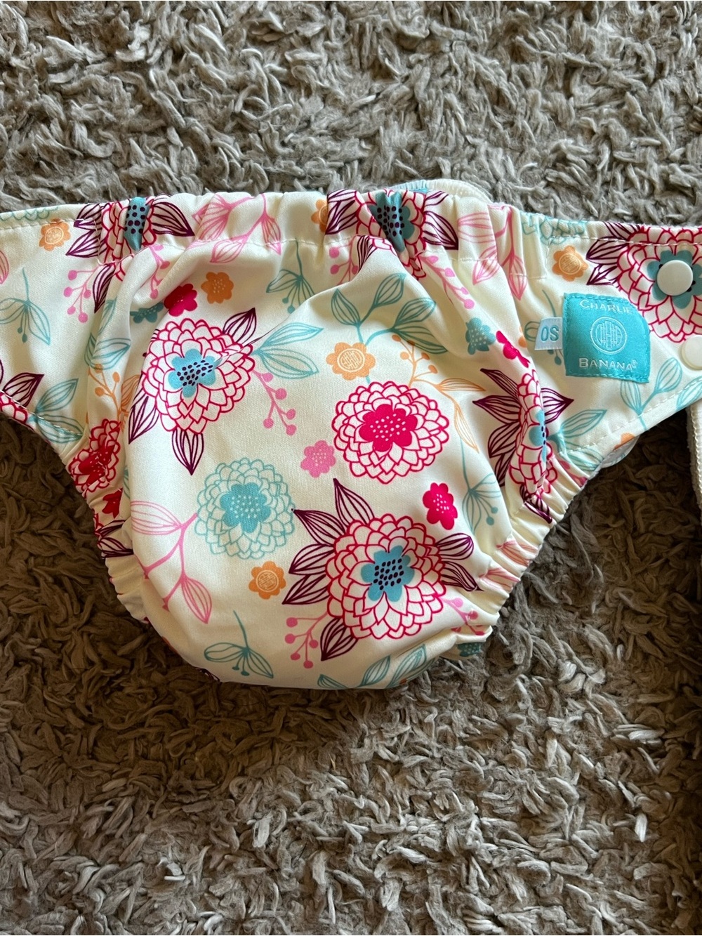Charlie Banana Floral Diaper Cover in Cream with Pink, Teal & Coral Flowers